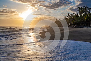 Gorgeous Caribbean beach at sunrise. Costeno beach on the Caribbean coast of Colombia