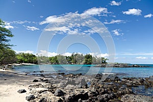 Gorgeous clouds reflecting in waters of Waialea  beach