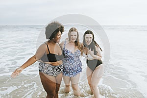 Gorgeous curvy women enjoying the beach