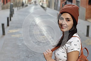 Gorgeous ethnic woman smiling with copy space