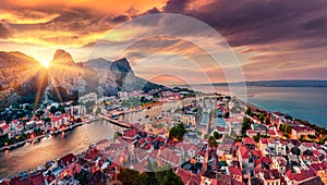 Gorgeous evening cityscape of old croatian resort - Omis town