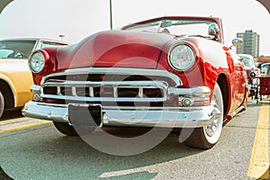 gorgeous front side view of red old classic vintage retro car