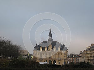 The gorgeous front view of the Mairie de Vincennes at sunset Paris