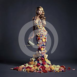 Gorgeous lady in dress of flowers