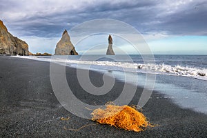 Gorgeous landscape with basalt rock formations Troll Toes on Black beach Reynisfjara near the village of Vik. Location: