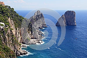 Gorgeous landscape of famous faraglioni rocks on Capri island, Italy.