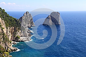 Gorgeous landscape of famous faraglioni rocks on Capri island, Italy.