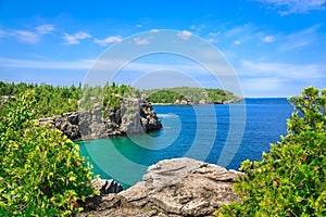 Gorgeous landscape view of great inviting Cyprus lake tranquil, turquoise water at beautiful Bruce Peninsula, Ontario