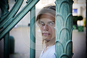 Gorgeous Long Hair Man behind Metal Bars