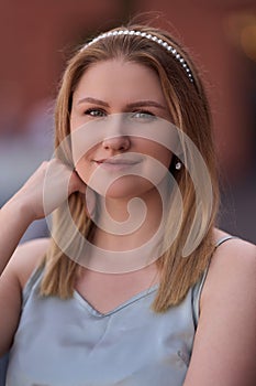 Gorgeous portrait of smiling young woman with separated second focus plane.