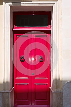 Gorgeous red british house door at house on Malta