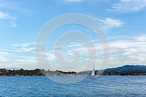 Gorgeous sea and sky colors in the dusk in the little Ormos Panagias gulf, Sithonia, Chalkidiki, Greece