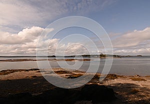 Gorgeous Seascape with Low Clouds Over the Bay