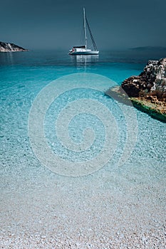 Gorgeous seascape with white yacht on calm water. Summer vacation holiday luxury travel romantic honeymooning concept photo