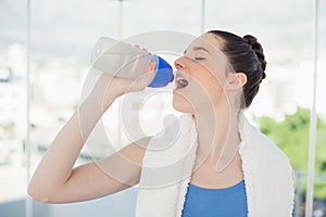 Gorgeous slender woman hydrating