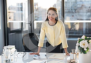 Gorgeous stylish woman is resting at work