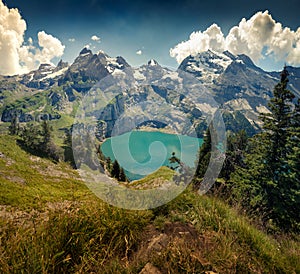 Gorgeous summer scene of unique Oeschinensee Lake.