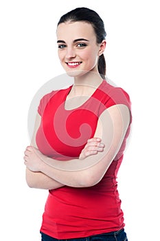 Gorgeous teen girl posing, arms crossed