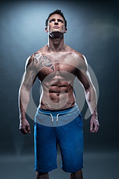 Gorgeous Topless Young Muscular Man Looking Up