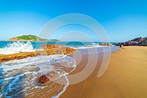 Gorgeous tropical beach turquoise transparent water unique rock boulders, Quy Nhon Bai Xep Vietnam central coast travel