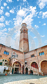 Gorgeous View Torre dei Lamberti clock tower and Medieval stairs of Palazzo della Ragione palace building in Verona