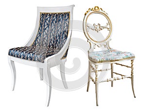 Gorgeous vintage chairs with white  legs, blue and gold padding. Isolated on white background