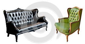 Gorgeous vintage green leather armchair and black leather sofa isolated on white background