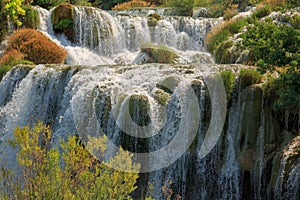 Gorgeous waterfall close-up shot on a sunny summer day