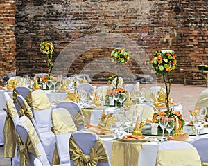 Gorgeous wedding chair and table setting for fine dining at outdoors