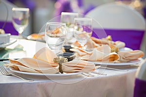 gorgeous wedding chair and table setting for fine dining at outdoors