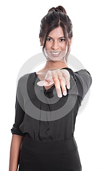 Gorgeous woman in black pointing at camera isolated on white background