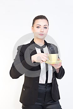 Gorgeous woman with a cup os coffe in hands isolated on white background