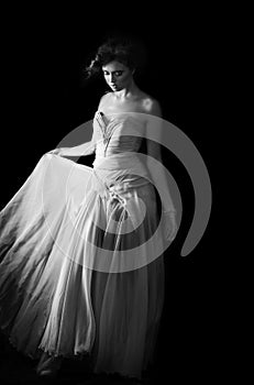 Gorgeous woman in evening dress in monochrome