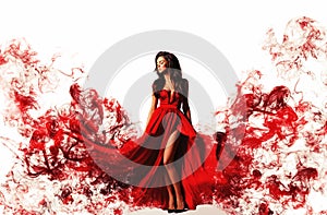 gorgeous woman in a fantasy red dress like a smoke. Studio picture, white background photo