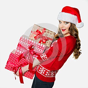 Gorgeous woman holding loads of heavy presents