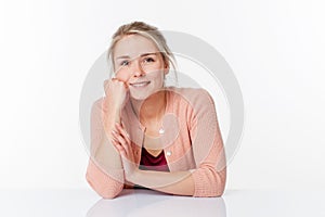 Gorgeous woman smiling and expressing wellbeing at work