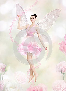 Gorgeous young woman as flower fairy