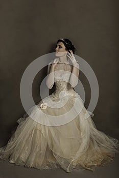 Gorgeous young woman in couture gown