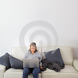 Gorgeous young woman using her tablet computer