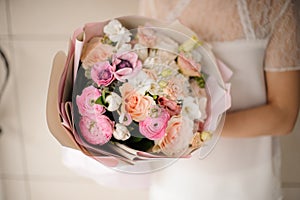 Gorgeuos wedding bouquet in a woman`s hands