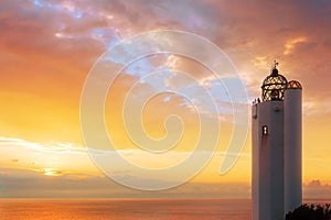 Gorliz lighthouse at sunset photo