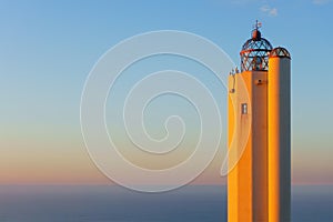 Gorliz lighthouse at sunset photo