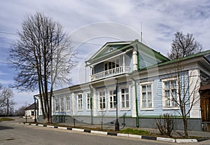 GORODETS, RUSSIA - APRIL 17, 2023: Wooden house built in 19 century with carved platbands