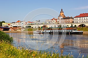 GorzÃÂ³w Wielkopolski town city at river Warta with a regional train type Newag Impuls 2 in Poland