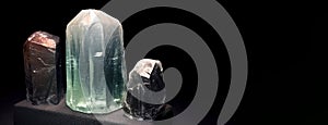 Goshenite is rare precious natural stone on black background. AI generated. Header banner mockup with space. photo