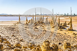 Gossan Reservoir with orange stalagmites on shore, Andalusia, Sp