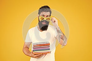 Got back into teaching. School teacher hold books. Bearded man teaching literature. Pedagogical techniques and teaching photo