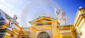 The Vivid Colored Bright Orange Rooftop Of The Magnificent Melk Abbey On A Bright Sunny Afternoon, Austria photo