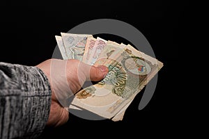 Hand holding different values of Russian rubel banknotes from 1993.. photo