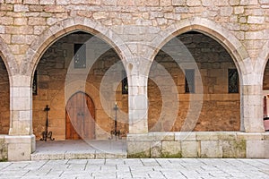 Gothic arches. Palace of the Duques of Braganca. Guimaraes. Portugal photo